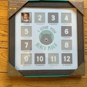 12 months picture frame- measures 15”x15”. Each picture slot is 2”x2”.